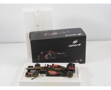 A SPARK 1:18 scale Lotus Renault E21 Formula 1 car, Kimi Raikkonen #7 winner Australian GP 2013, small detail part detached b