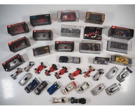 A large group of boxed and unboxed mostly 1:43 scale race cars by BRUMM, ONYX, CONRAD and others - G/VG in G boxes where boxe