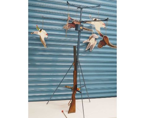 A EUREKA BREVETE (France) game bird shooting game, circa 1950s, comprising a twin barrel toy gun with six wooden darts (fully