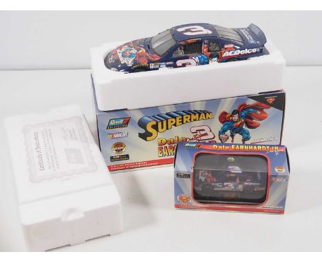 A pair of ERTL diecast Nascar race cars comprising 1:43 and 1:18 scale variants of Dale Earnhardt's car in Superman Racing li