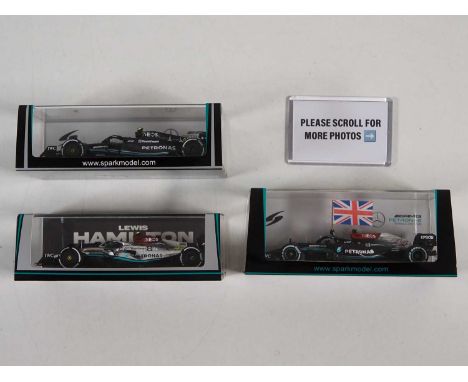 A group of SPARK 1:43 scale McLaren / Mercedes-AMG Formula 1 cars, all representing cars driven by Lewis Hamilton 2021-23 - V
