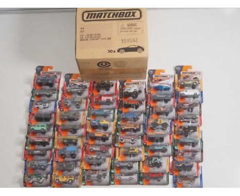 A MATCHBOX (Mattel) trade box containing 50x mixed Matchbox carded cars, as new - VG/E in VG box