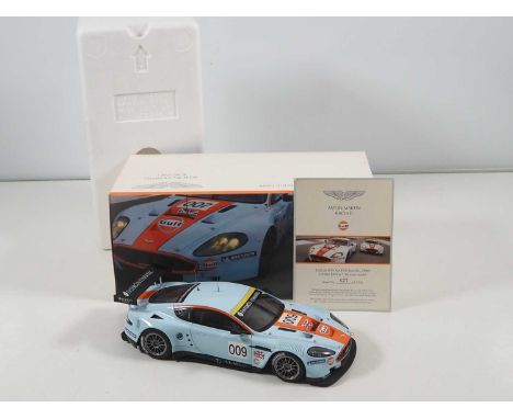 An AUTOART (for Aston Martin Racing) 1:18 scale Aston Martin DBR9 2008 race car in Gulf livery - VG/E in G/VG box