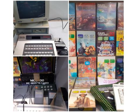 Ab Amstrad 640k personal computer PC-ECD, together with a BBC Bridge console and two games, a Philips G7000 Videopac computer