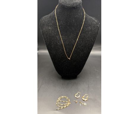 A 9ct gold necklace, together with a 9ct gold earring having pearls 1.2g, along with a yellow metal chain A/F, testing 9ct an