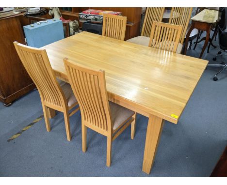 A modern light oak rectangular kitchen table, 78cm h x 153cm w, together with six matching chairsLocation: 