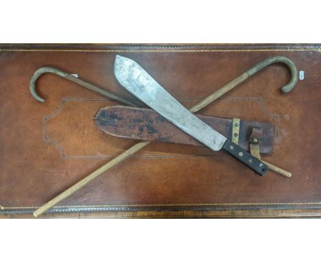 A S & J Kitchin Ltd Sheffield Machete dated 1955 with broad arrow, in brown leather sheath embossed Hugh Carson & Co Ltd Otta