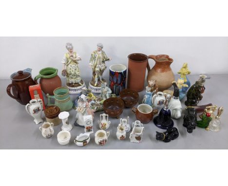 A mixed lot to include two late 19th/early 20th century porcelain figures, Poole pottery retro vase, Avon perfume bottles, Cr