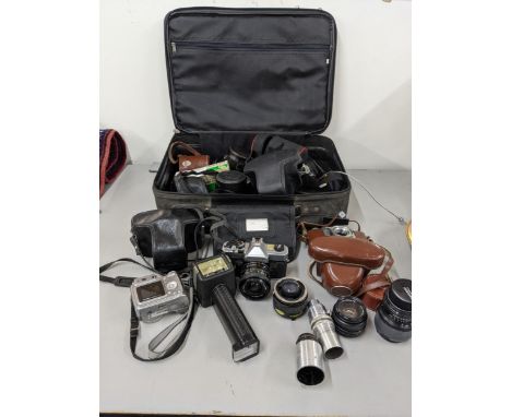 Photographic equipment to include Fujica STX-IN, Kodak Easy Share Z700, Agfa Ambi Silette and others, all housed in a black c