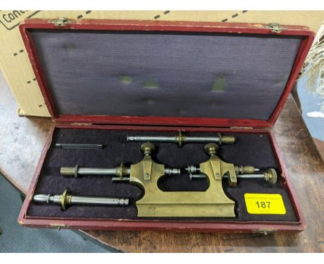 A Tour a Pivoter watchmaker's tool in a fitted case Location: 2.3 