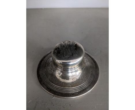 A George V silver capstan inkwell, engraved initials to lid, Birmingham 1921 Location: 