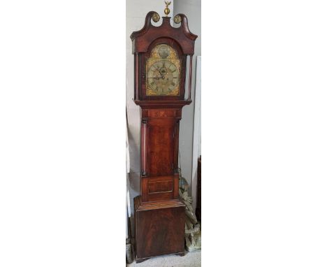 A George III mahogany 8 day longcase clock having a broken swan neck pediment and gilt brass dial, inscribed Rich Purratt New