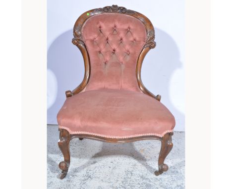 Victorian walnut nursing chair, carved cresting, cabriole legs, button dralon upholstery, width 62cm.