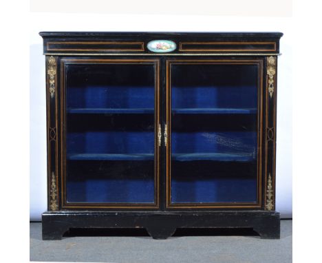 Napoleon III ebonised and gilt metal mounted credenza, with a sevres porcelain inset to the frieze, painted with a figurative