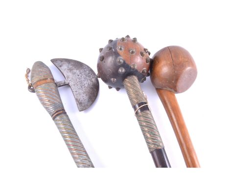 African hardwood knobkerrie, the head with brass pins, wire bound shaft, 61cm; another African hardwood knobkerrie, 58cm, spl