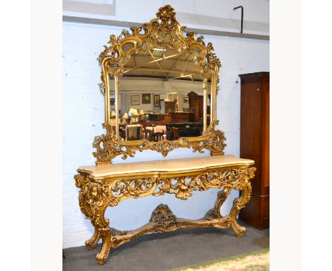 Reproduction Florentine style console table, serpentine marble top, carved and scrolled, gilt painted, together with a matchi