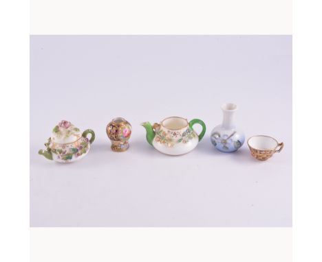 Royal Worcester circular box, floral decoration on a blush ground, diameter 5cm; small items of porelain; miniature tea ware;
