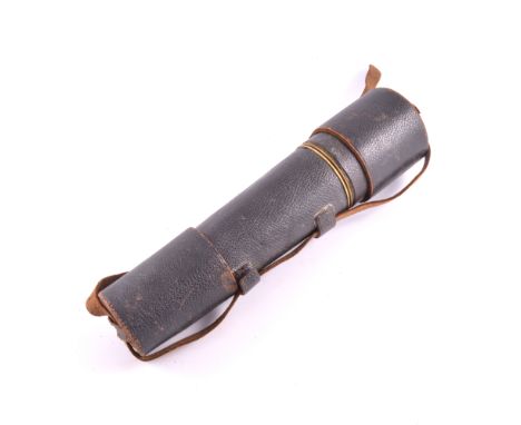 A four draw brass telescope "The Target" by Aitchison & Co, opticians to H.M.Gov't, London & Provinces, in a leather carry ca