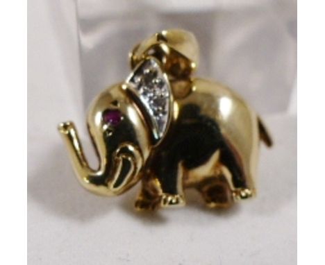 9CT RUBY AND DIAMOND PENDANT. 9ct gold ruby and diamond set elephant pendant