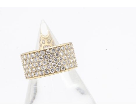 A continental 18ct gold and pave set diamond full eternity band, marked to side of shank 750, ring size M 1/2, 1cm wide, 6.5g