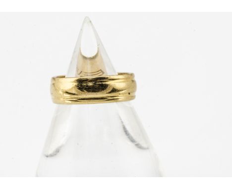 An 18ct gold court ribbed wedding band, by Eurowed, with double band to exterior, dated London 1971, 6.2g, ring size J 