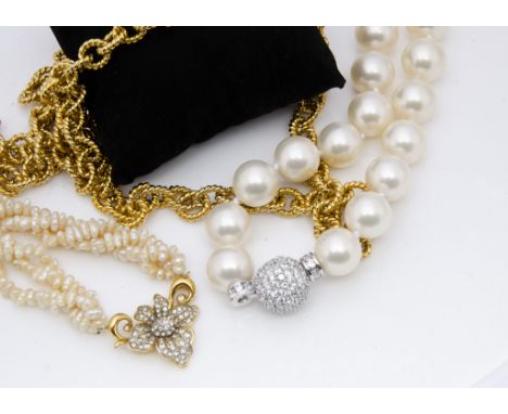 A large collection of costume jewellery, including silver and paste set earrings, a freshwater and paste set pearl necklace, 