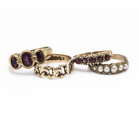 A 19th Century half cut pearl ring, the seven pearls in collet settings on a worked shank, ring size L, together with a 9ct g