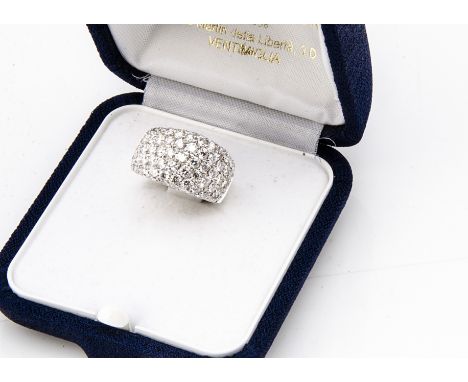 A continental white 18ct gold diamond bombe shaped ring, brilliant cuts in raised pave setting, approximately 1.6ct, ring siz
