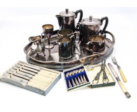 A collection of silver plate and other items, including an oval tray, four piece tea set, six silver coffee spoons in box, a 