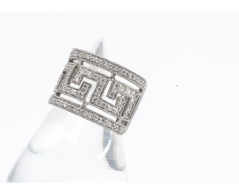 An 18ct white gold diamond set Greek key style dress ring, ring size M, total diamond weight 0.64ct, 1.4cm wide, 9.6g 