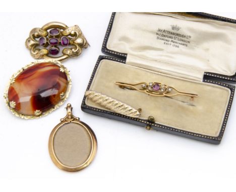 An amethyst and gold Victorian brooch, an agate and gold oval brooch, a 9ct gold oval open front and back locket, gold fronte