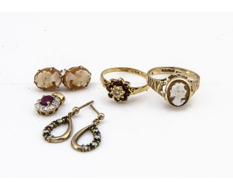 A 9ct gold cameo ring, ring size O, a pair of matched earrings, a garnet and diamond dress ring, ring size M, a ruby and diam