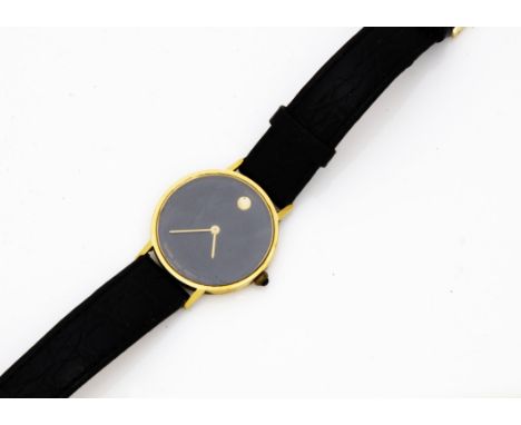 A Movado Zenith quartz 18ct gold cased dress watch, 31mm, black dial, on black leather strap not tested