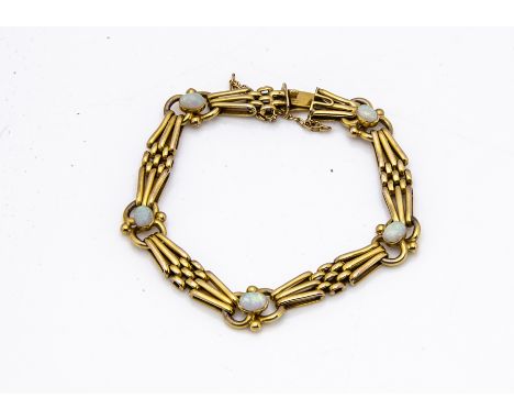 A 9ct opal three bar bracelet, with box clasp and tongue, with safety chain, 20cm, 16g&nbsp;Please see the additional images.