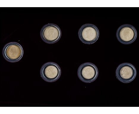 A Royal Mint Queen Elizabeth II Royal Portrait Collection of gold four full sovereigns and three half sovereigns, in fitted b