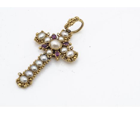 A late 19th/early 20th Century Italian gold ruby and seed pearl cross pendant, the graduated oval half cut pearls in beaded s