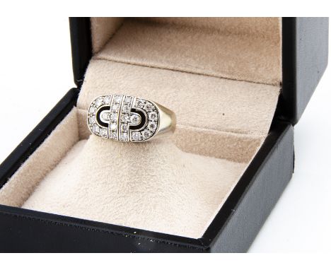 A Bvlgari 18ct gold diamond buckle ring, the brilliant cuts in claw settings, ring size I, diamond weight 0.72ct, 7.2g, boxed