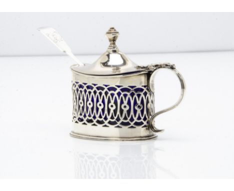 A George V silver mustard, with blue glass liner and Victorian silver mustard spoon marked Exeter 1879 