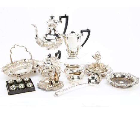 A group of silver plated items, including a four piece tea set, chamberstick, pair of bottle coasters, ladle, egg waiter, ser