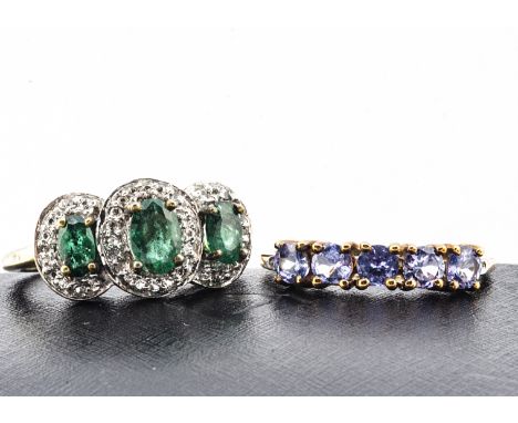 Two contemporary gem set rings, including a silver gilt emerald and white topaz triple cluster, ring size N and a five stone 