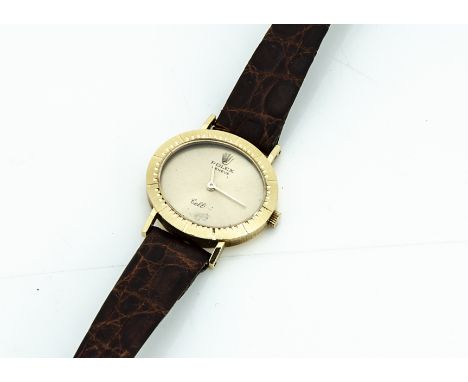 A c1980s Rolex Cellini 18ct gold cased lady's wristwatch, oval shaped case 26mm wide, gilt dial, worn lettering, 19 jewel man