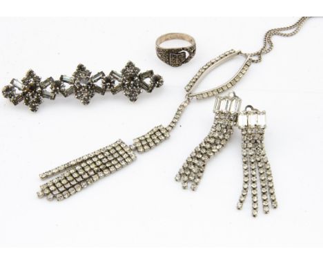 A small quantity of paste jewels, including a bar brooch, a marcasite buckle ring, a pair of drop clip on earrings and pendan