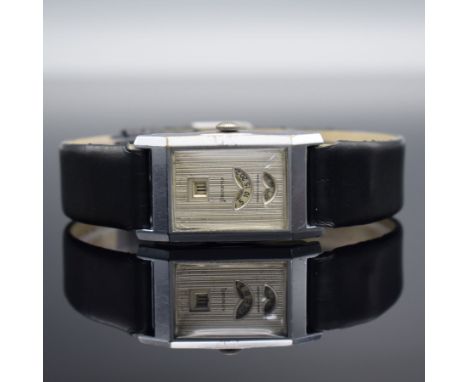 HELVETIA rechteckige Armbanduhr mit digitaler Zeitanzeige,  Schweiz um 1930, Handaufzug, verchr. Scharniergeh., silb. Zifferb