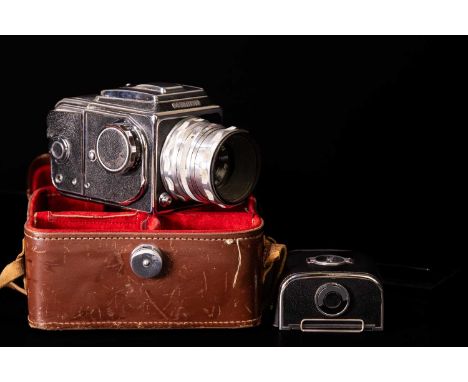 ZENITH; an 80 camera with accessories and 7002783 Industar lens, fitted in leather travel case.