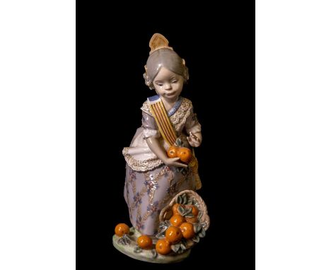 LLADRO; a model of an Oriental girl holding oranges above a basket of spilled oranges, height 18cm.Condition Report: Light gl