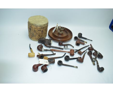 A carved wooden pipe bowl in the form of a bearded gentleman, probably Germany; together with an assortment of pipes, various