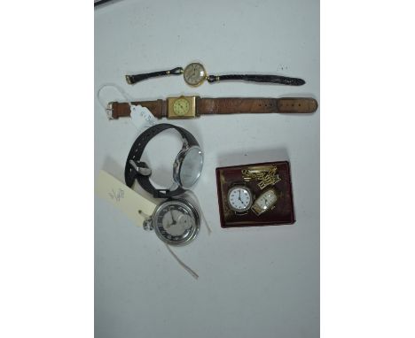 Three gold-cased cocktail watches; a wristwatch; and a pocket watch.