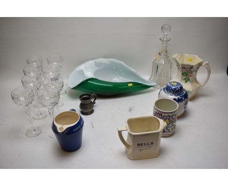 A Chinese blue and white ginger jar; Ringtons Malingware jug; two whisky water jugs; a Victorian mallet-shaped decanter; and 
