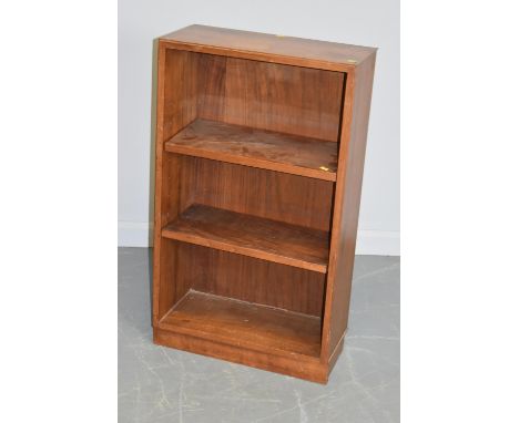 Gordon Russell - A mid-century teak open books shelf, with caddy top above three open shelves, raised on a plinth base, 92 x 