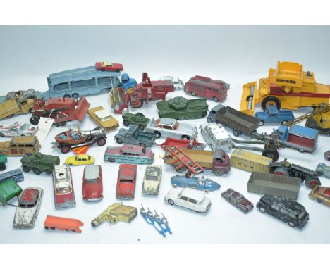 Assorted Dinky toys, unboxed, including: a Bloor Knox bulldozer; a Pullmore car transporter; Centurion tank; fire engine; Tal